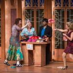 A cast of four ladies throw underwear at each other during a scene during the play Menopause the Musical on stage at the Algonquin Commons Theatre